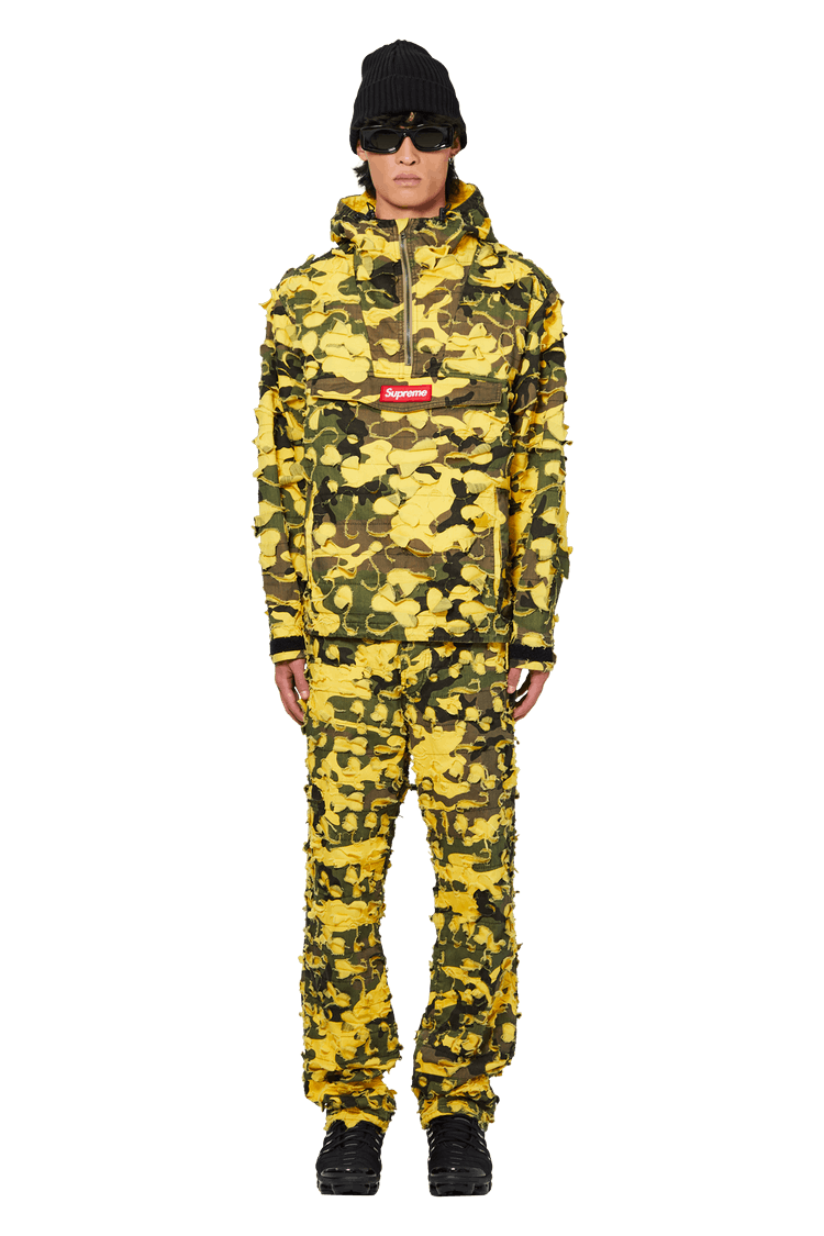 Model wearing Supreme x Griffin 5-Pocket Jean 'Yellow Camo'