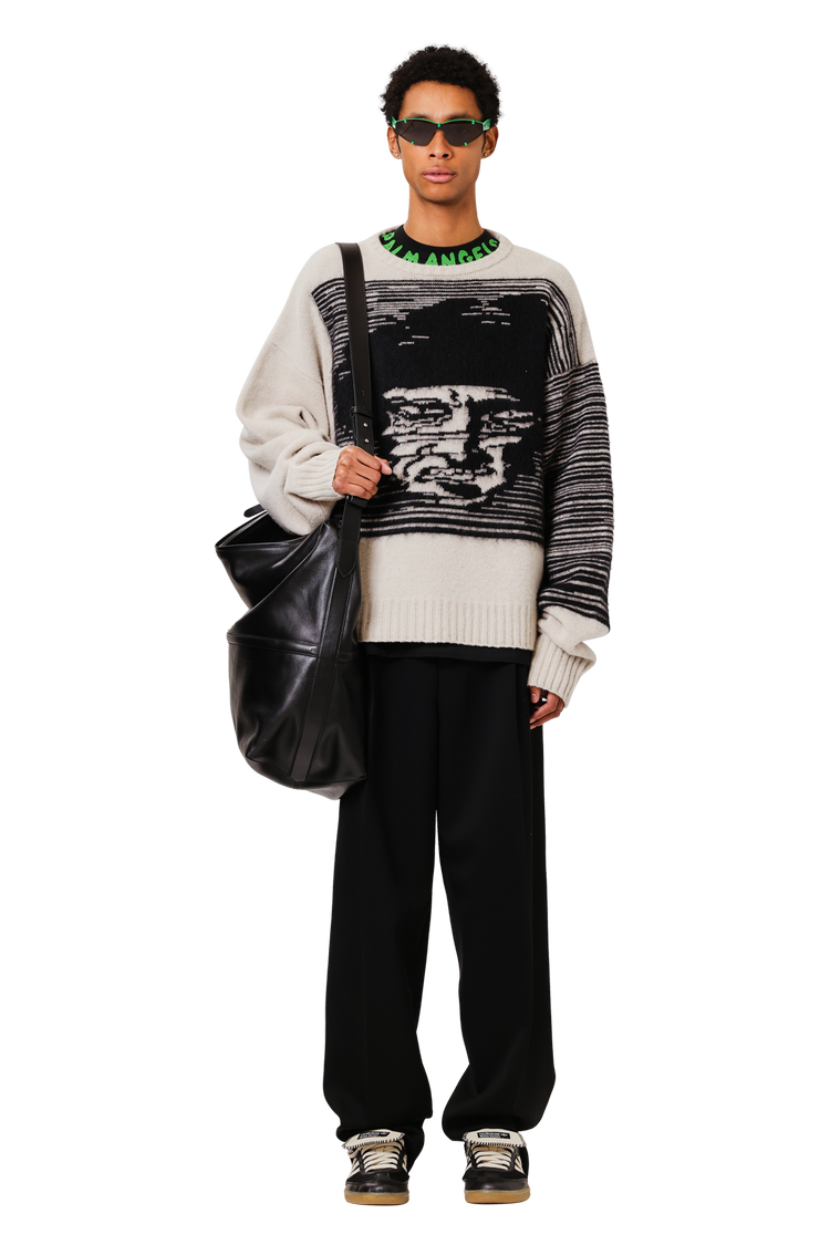 Model wearing Enfants Riches Déprimés October All Over Crewneck Sweater 'Oat/Black'