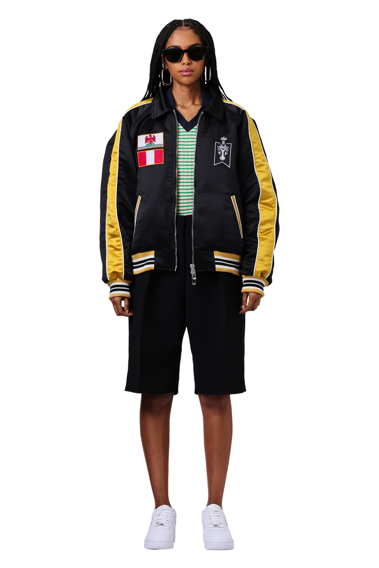 Model wearing Jacquemus Le Bermuda Ovalo Bermuda Shorts 'Black'