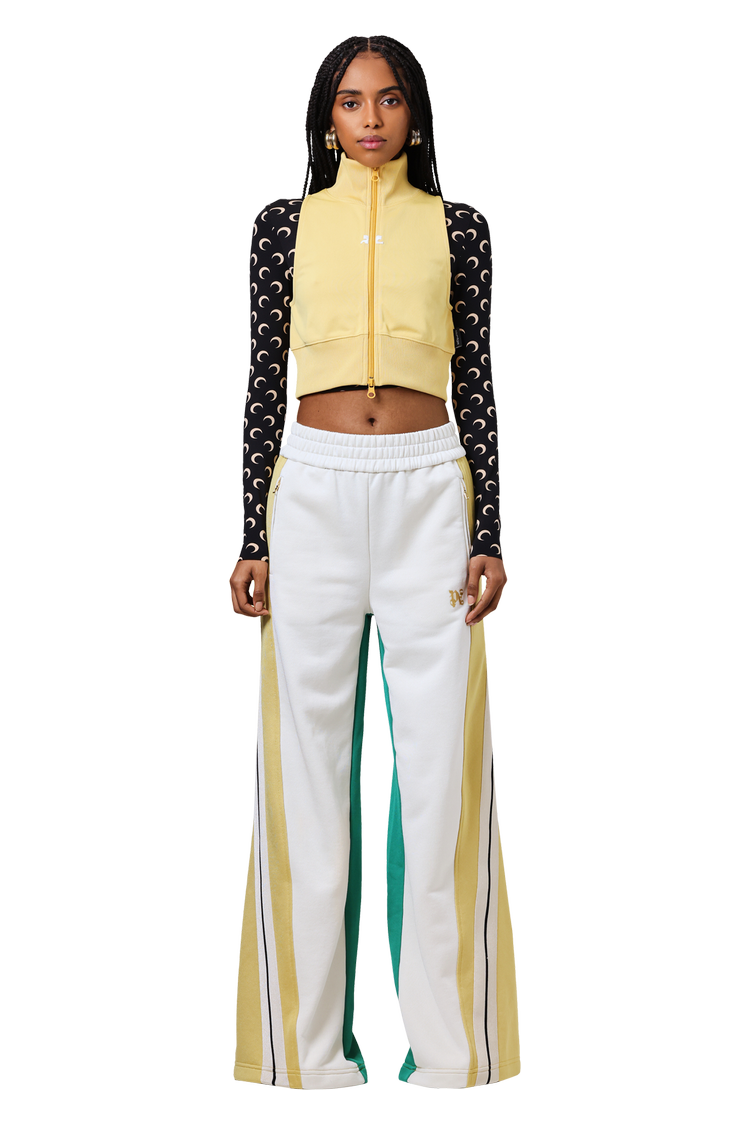 Model wearing Palm Angels Monogram Colorblock Wide Track Pant 'Off White/Multicolor'