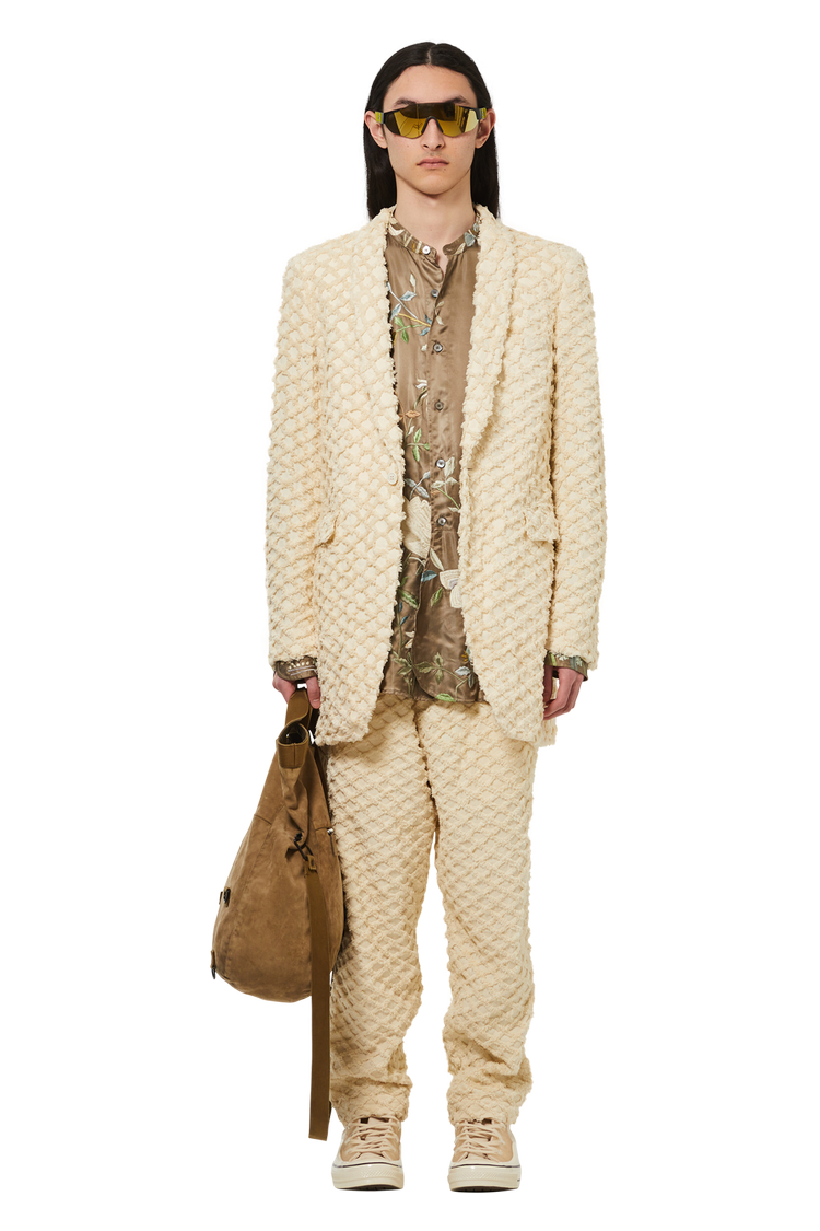 Model wearing Vintage Helmut Lang Messenger Bag With D-Ring And Fold Top 'Tan'