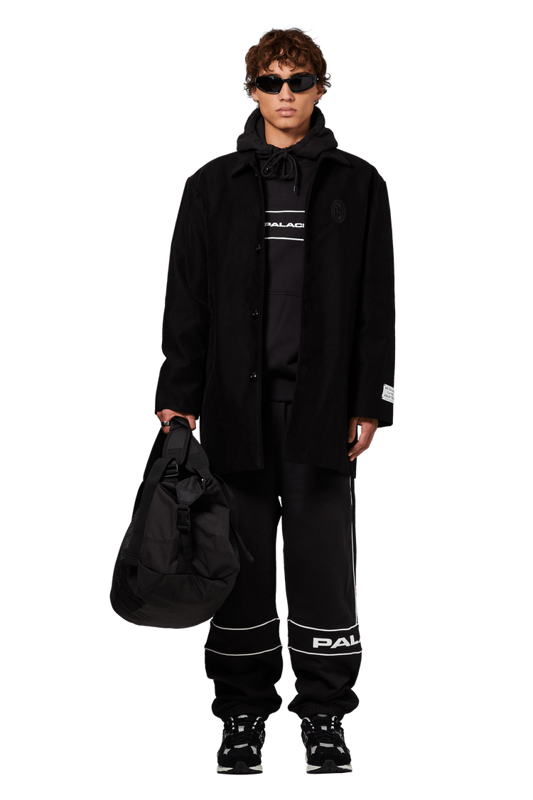 Model wearing Palace Cordura Eco Hex Ripstop Clipper Bag 'Black'