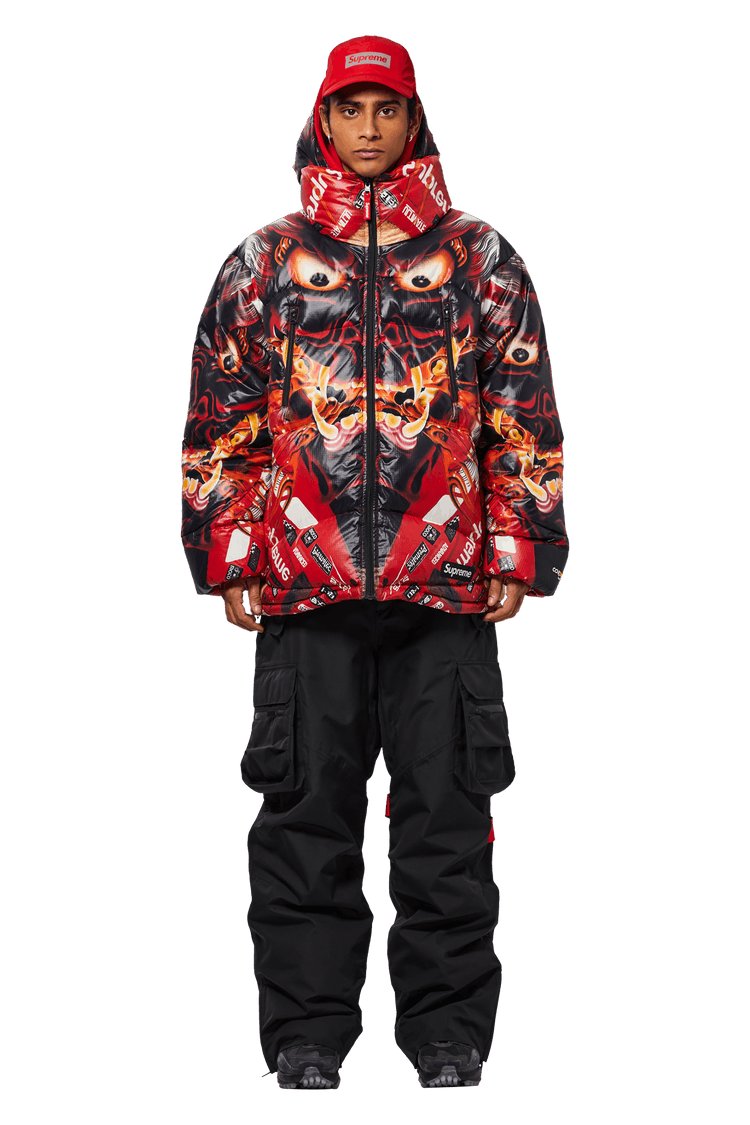 Model wearing Supreme Reversible Featherweight Down Puffer Jacket 'Red'