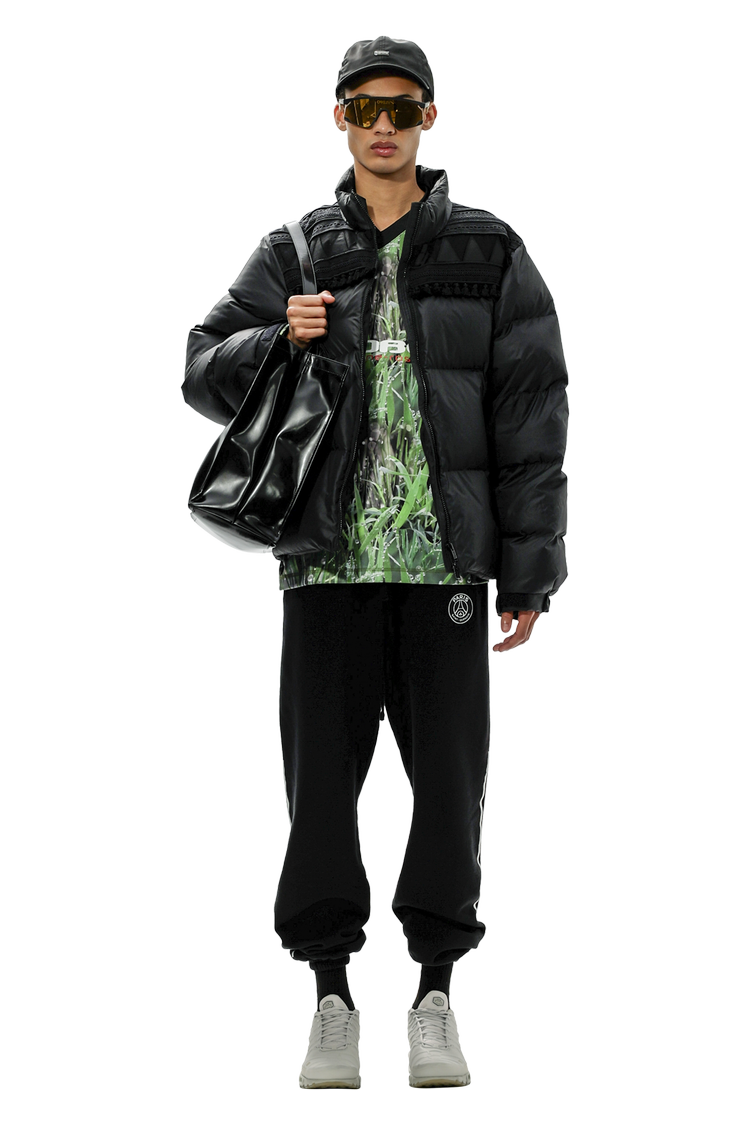 model wearing Undercover Puffer Jacket 'Black'