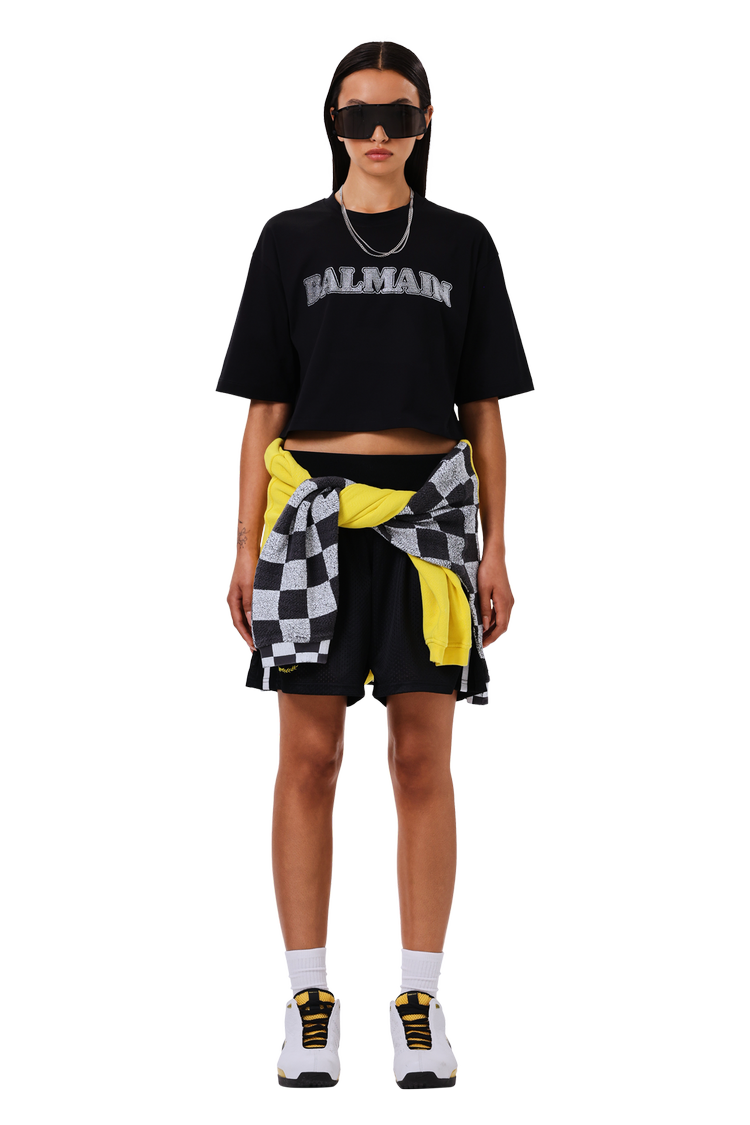 Model wearing ERL Swirl Hoodie 'Yellow Checker'