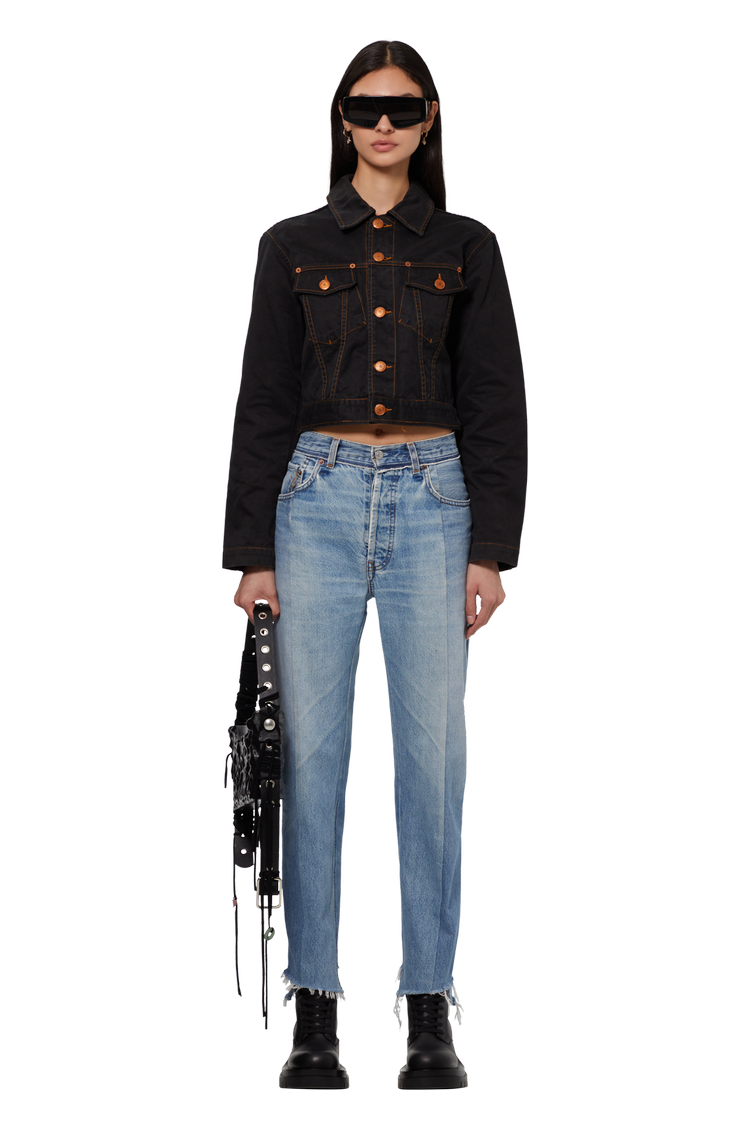 model wearing GOAT Exclusive for Manifesto Ottolinger Signature Baguette Bag 'Metallic Stone'