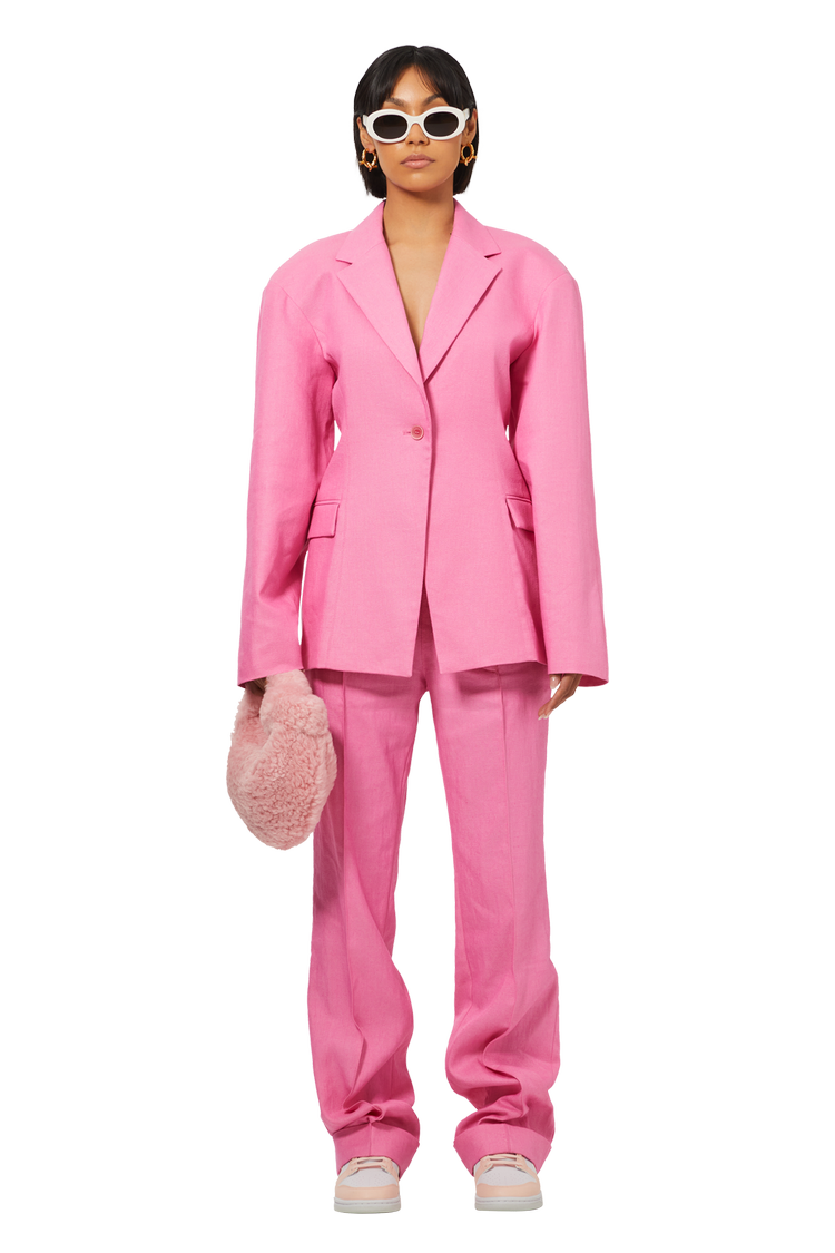Model wearing Jacquemus La Veste Fresa 'Pink'