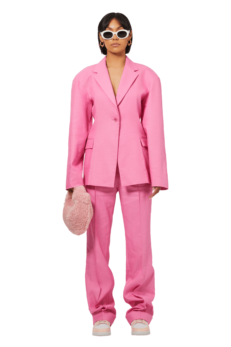 Model wearing Jacquemus La Veste Fresa 'Pink'