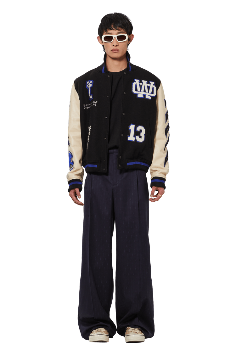 Model wearing Off-White Patch Detail Bomber Jacket 'Black/Blue'