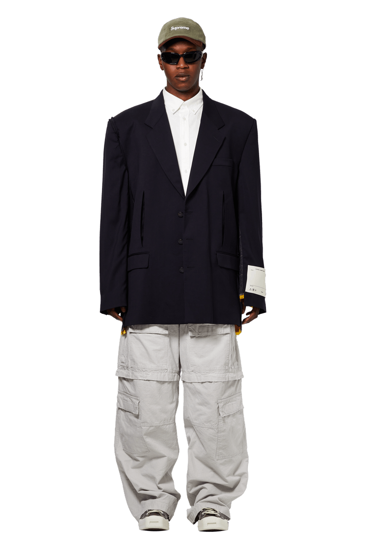 model wearing Balenciaga Large Cargo Pants 'Light Grey'