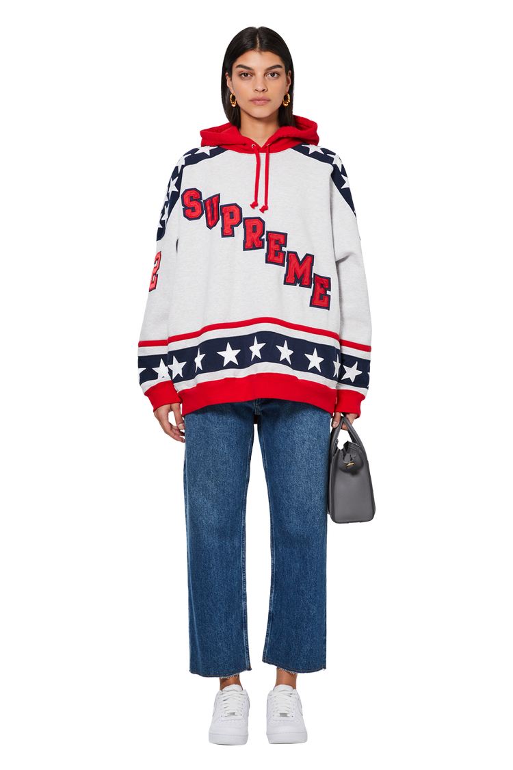 Model wearing Supreme Hockey Hooded Sweatshirt 'Ash Grey'