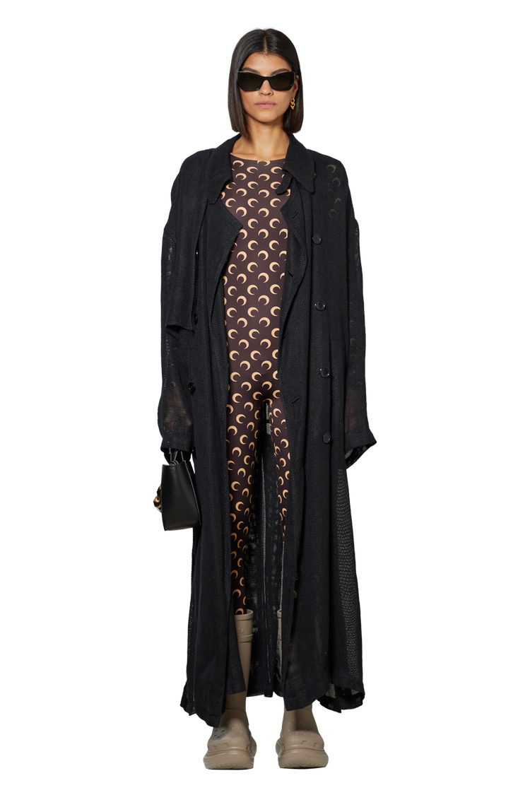 Model wearing Raf Simons Icarus Surgit Perforated Overcoat 'Black'
