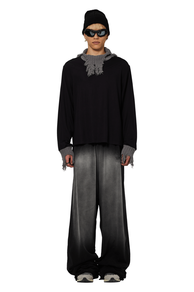 Model wearing Vetements Double Jersey Sweatpants 'Washed Black'