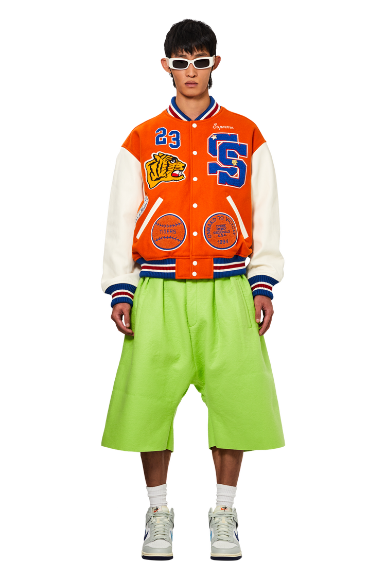 Model wearing Supreme Tiger Varsity Jacket 'Orange'