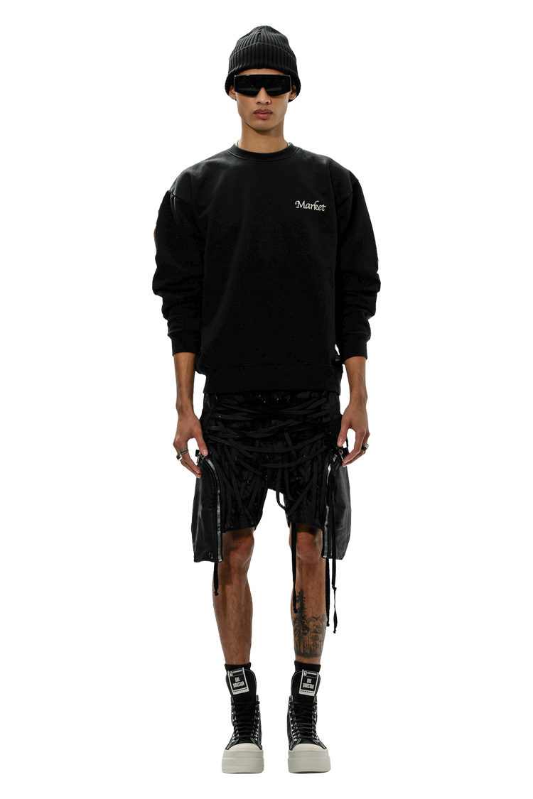Model wearing Rick Owens Tc Thomas Boxer Cargo Shorts 'Black'