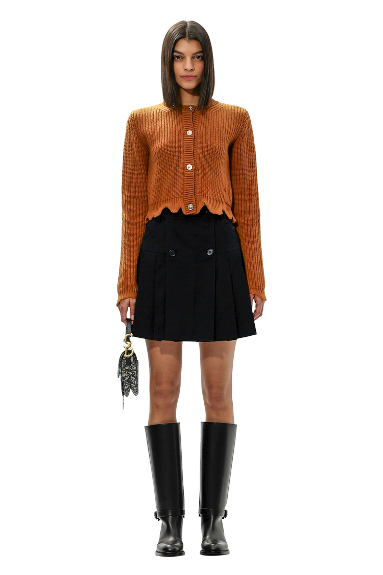 model wearing Simone Rocha Pleated Mini Kilt Skirt 'Navy'