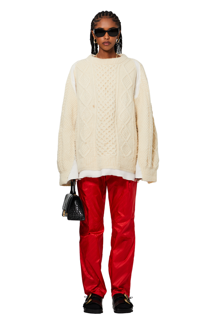 Model wearing Givenchy Logo Trousers 'Red'