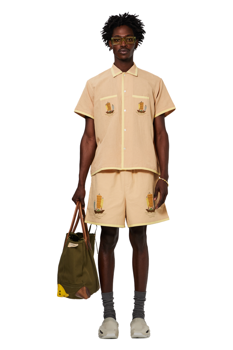 Model wearing Bode Ship Applique Short-Sleeve Shirt 'Tan/Multicolor'