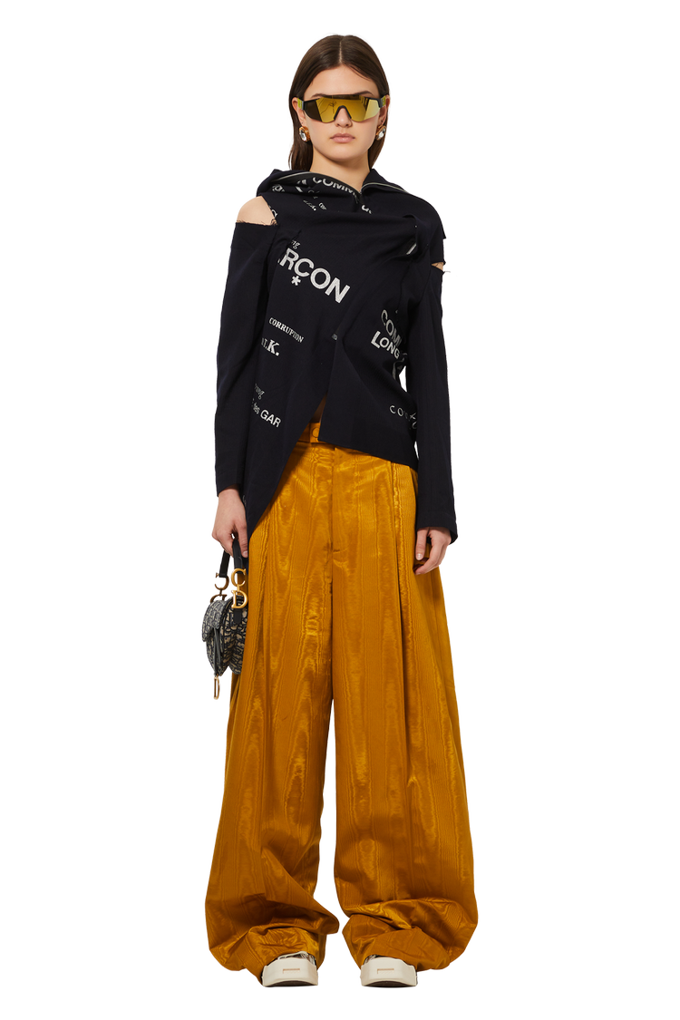 Model wearing Gucci Striped Trousers 'Gold'